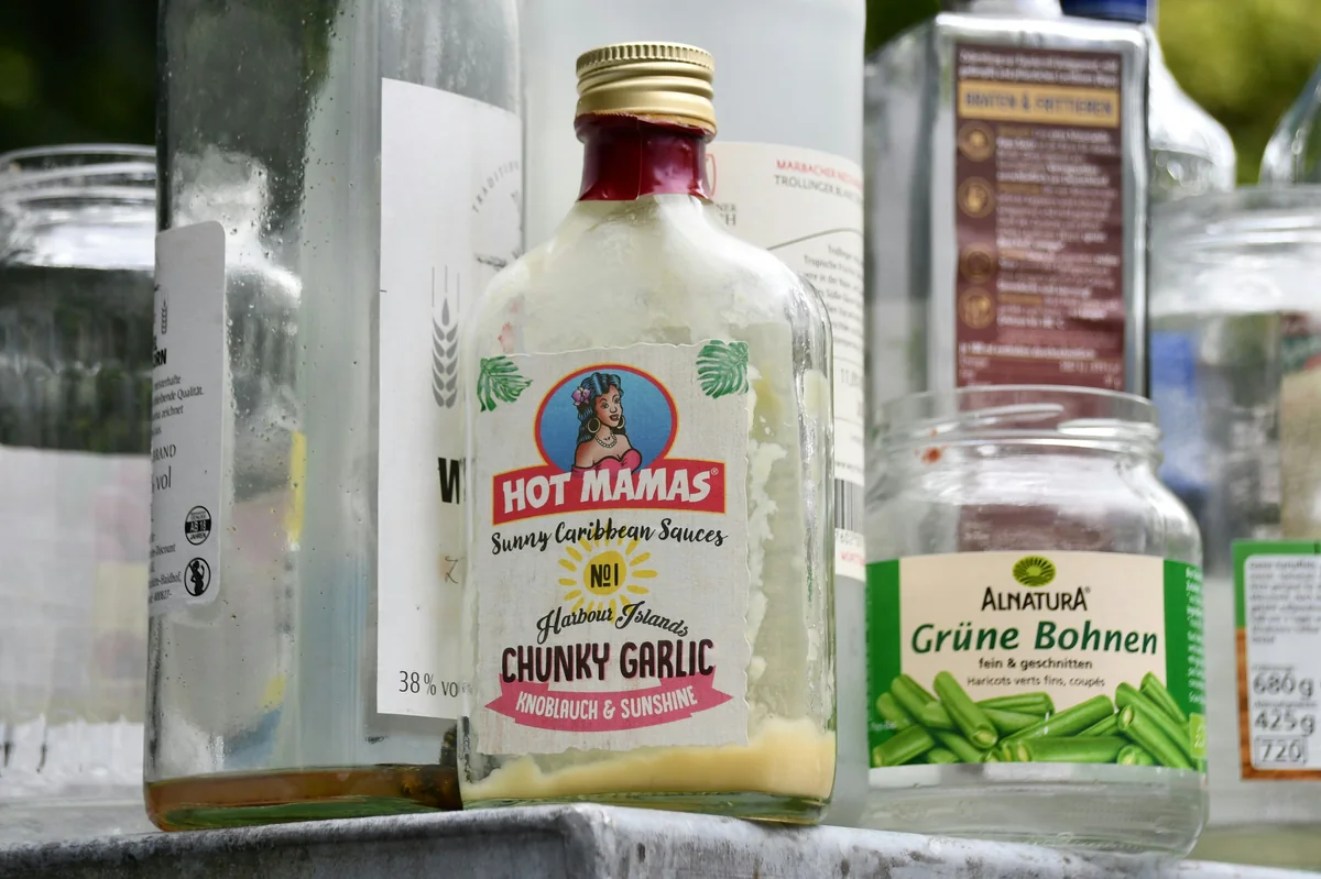 a bottle of gravy garlic sitting on top of a table - best alternative products to mainstream household giants