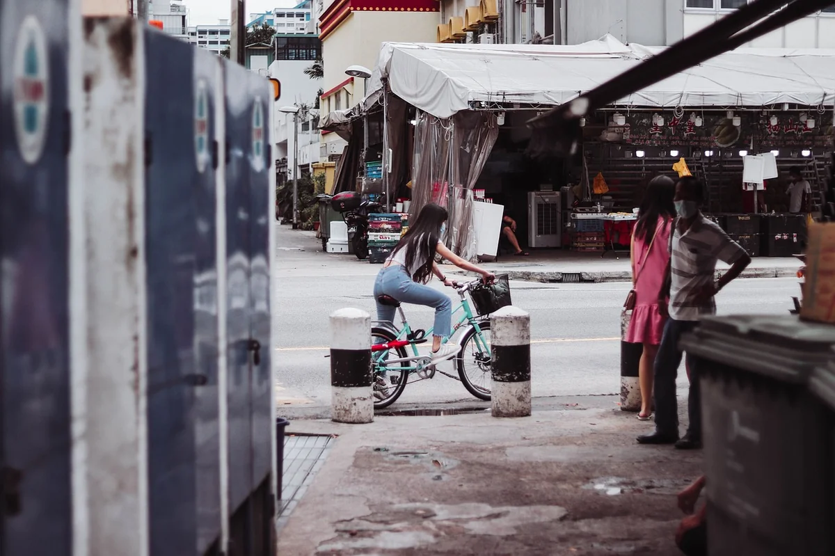 women, bicycle, street, geylang street, lifestyle, singapore, singapore, singapore, singapore, singapore, singapore - best portable daily essentials for a digital nomad lifestyle