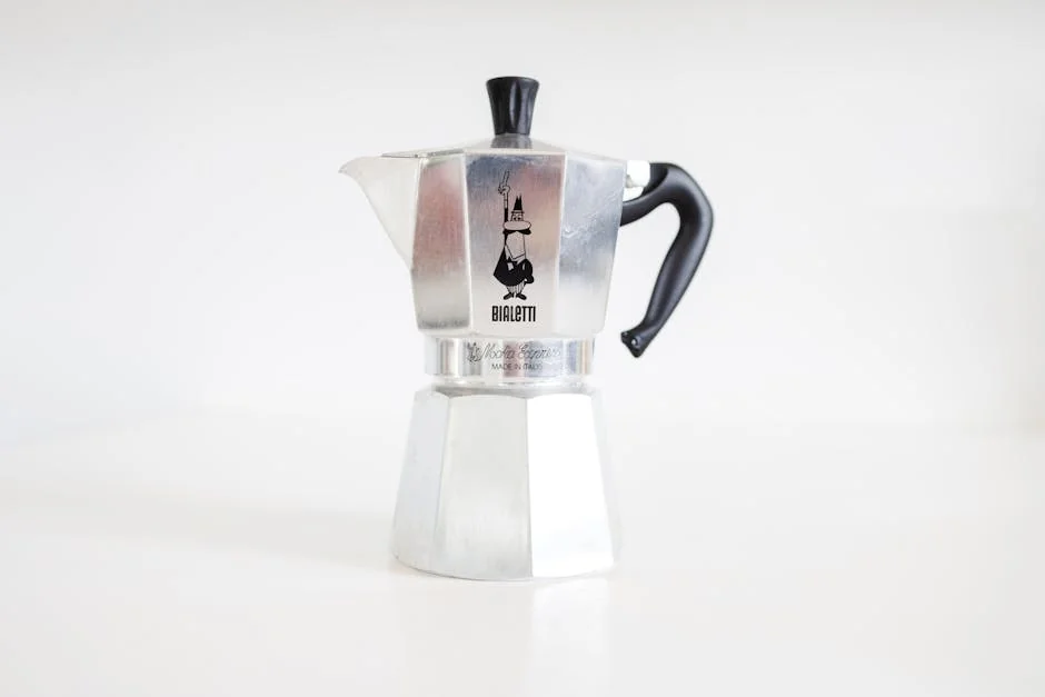 Minimalist shot of a Bialetti Moka pot, highlighting its iconic design. - how to choose the right coffee maker for your morning routine