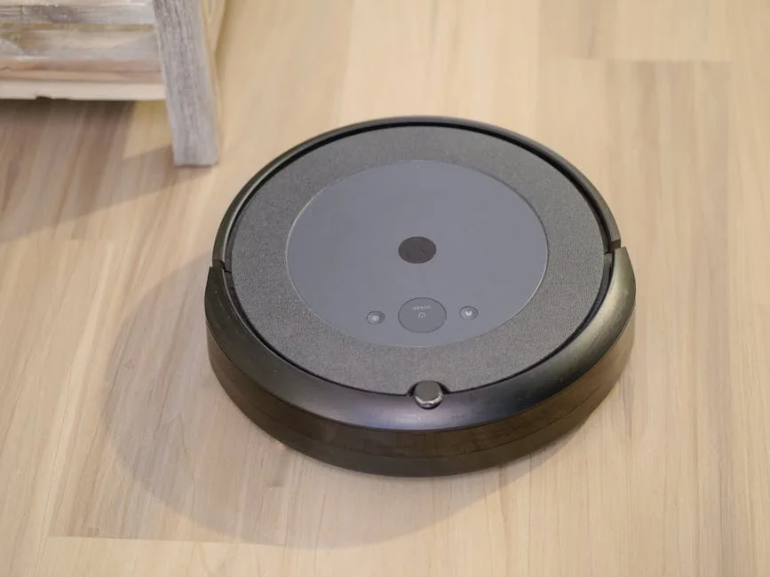 High-tech robotic vacuum cleaner efficiently cleaning modern floor indoors. - comprehensive review of the latest smart home cleaning devices