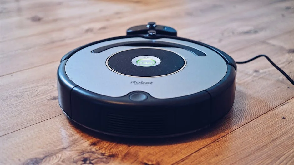 Close-up of a robotic vacuum cleaner operating on a hardwood floor, showcasing modern cleaning technology. - comprehensive review of the latest smart home cleaning devices