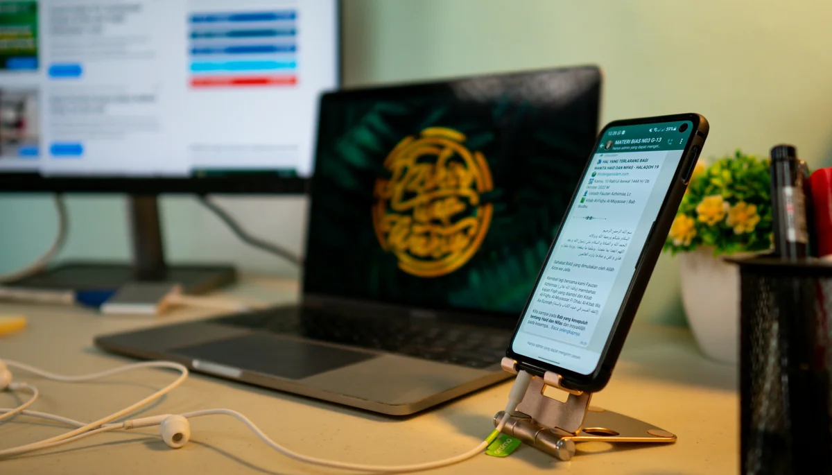 Phone focus with a working desk background - home office workspace - Professionalgrade home office equipment reviews for remote workers