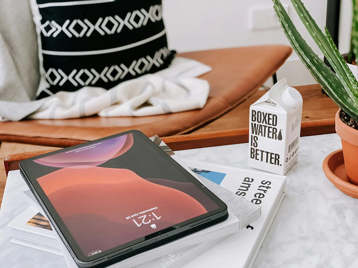 Boxed Water - work from home desk with iPad pro - top minimalist daily products for a clutterfree life