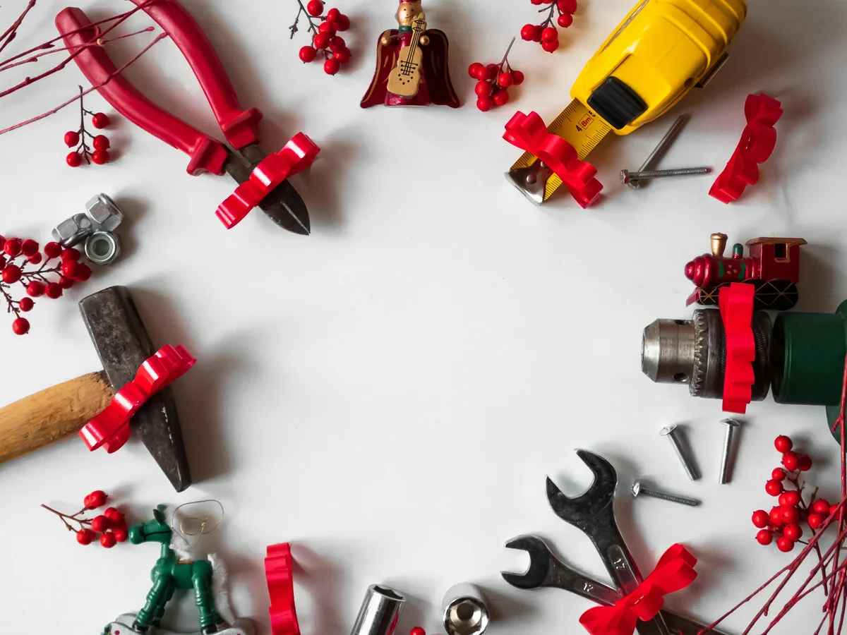 Working tools with Christmas decorations and white background - the ultimate list of lifeimproving household hacks and tools