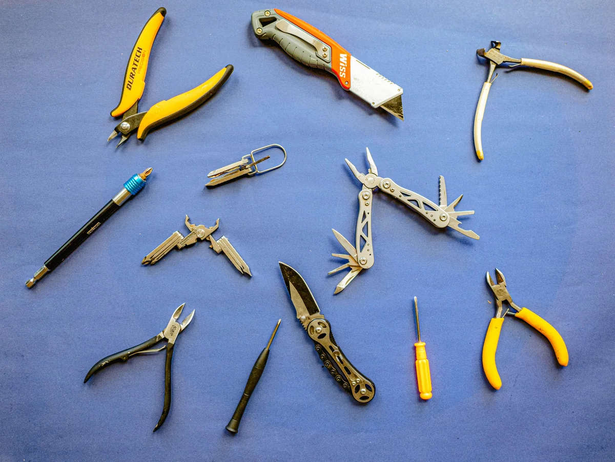 a bunch of tools that are laying on a table - the ultimate list of lifeimproving household hacks and tools