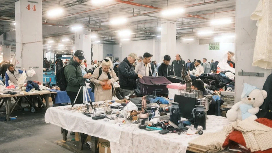 Bargain hunters explore diverse items at an indoor flea market in İstanbul, Türkiye. - valuebased shopping guide for highfrequency use items
