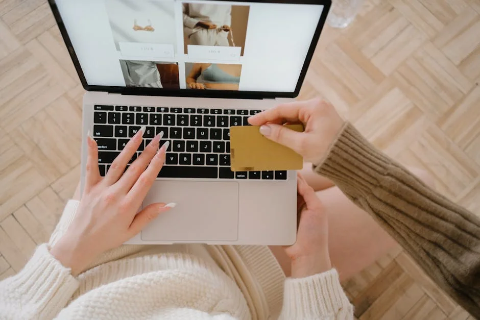 Person shopping online using a laptop and credit card, highlighting e-commerce convenience. - valuebased shopping guide for highfrequency use items